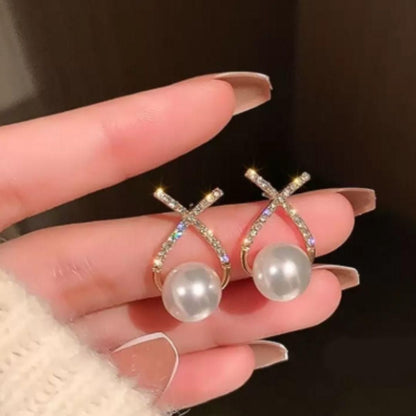 Sparkling Cross Pearl Studs for the Trendy Indian Look